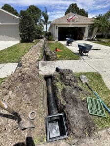 Drainage Services such as Channel Drains, French Drains, Dry Wells, and Yard Drains in Plant City & Tampa Florida