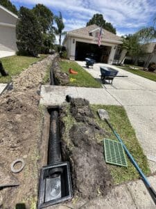 Drainage Services such as Channel Drains, French Drains, Dry Wells, and Yard Drains in Plant City & Tampa Florida